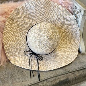 Elegant Cream Sun Hat with Black Trim